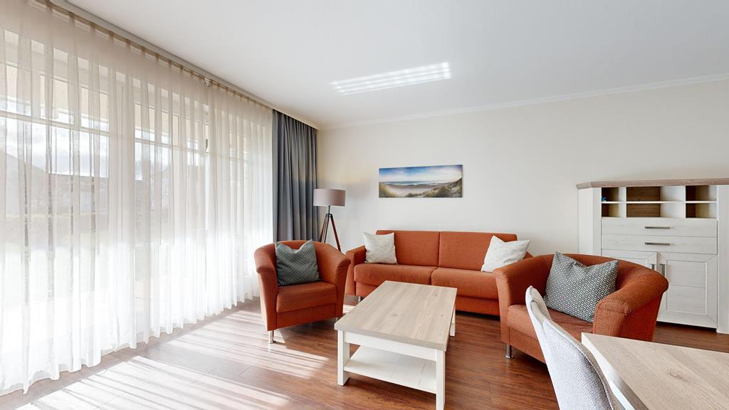 Foto der Wohnung RUG-15-002-14-duenenpark-binz-sitzbereich1.JPG